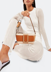 Runway rust sling bag